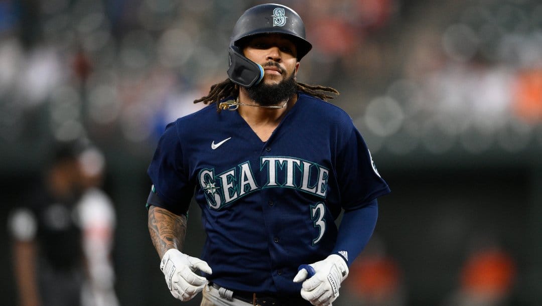 Seattle Mariners' J.P. Crawford rounds the bases on his home run during a baseball game against the Baltimore Orioles, Wednesday, June 1, 2022, in Baltimore.