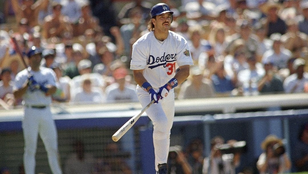 Los Angeles Dodgers’ Mike Piazza watches his eighth inning, two run home run leave the park, scoring the winning run in the Dodgers’ 3-2 win over the Colorado Rockies on Saturday, July 6, 1996 at Dodger Stadium in Los Angeles.