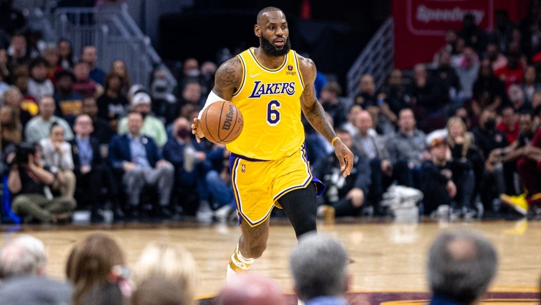 Lakers star LeBron James dribbles