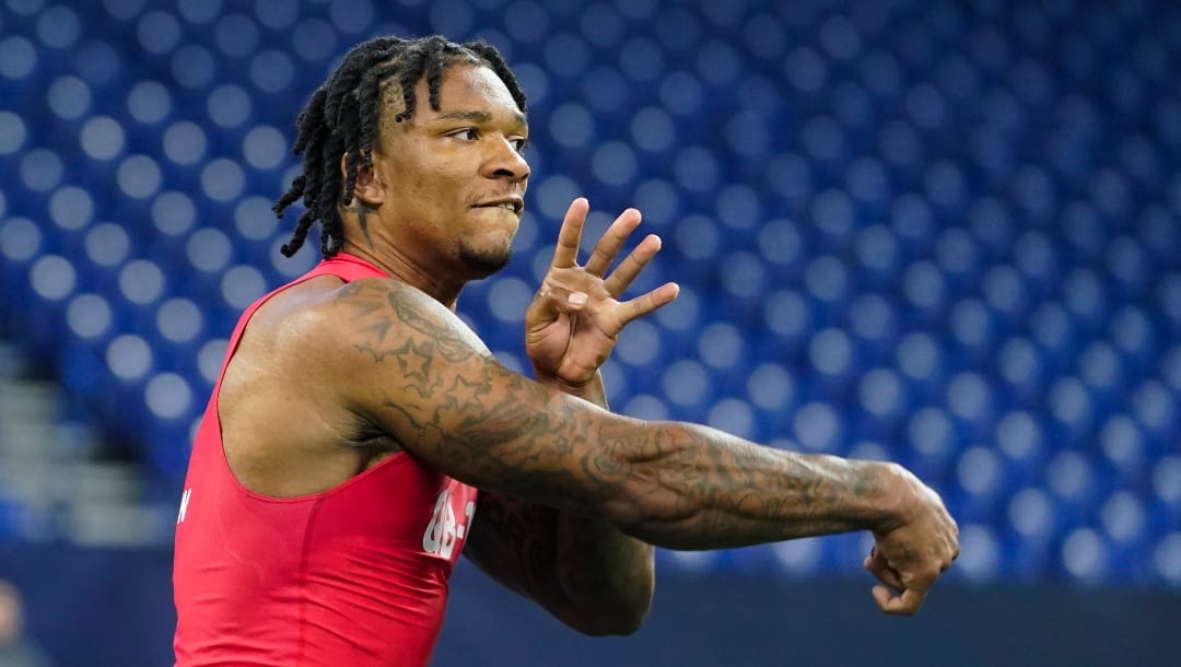 Florida quarterback Anthony Richardson runs a drill at the NFL football scouting combine in Indianapolis, Saturday, March 4, 2023. (AP Photo/Darron Cummings)