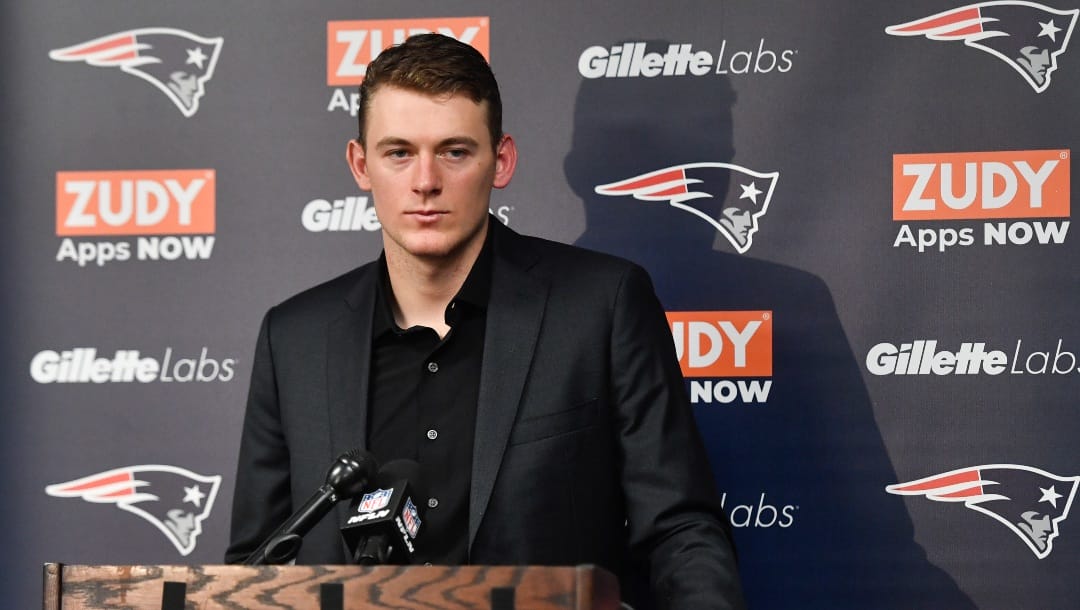 New England Patriots quarterback Mac Jones (10) speaks during a news conference after their NFL football game against the Buffalo Bills, Sunday, Jan. 8, 2023, in Orchard Park. (AP Photo/Adrian Kraus)