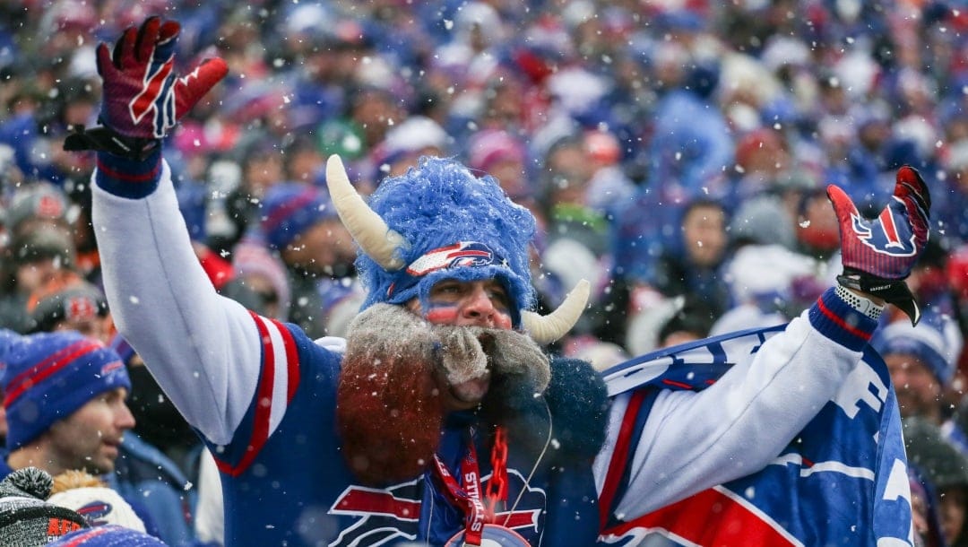 A Buffalo Bills fan reacts during the second quarter of an NFL division round football game against the Cincinnati Bengals, Sunday, Jan. 22, 2023, in Orchard Park, N.Y. (AP Photo/Joshua Bessex)