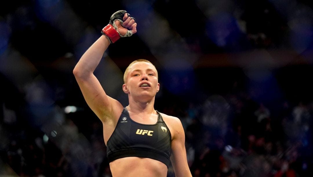 FILE - Rose Namajunas reacts after defeating Weili Zhang during a straw weight mixed martial arts championship bout at UFC 268.