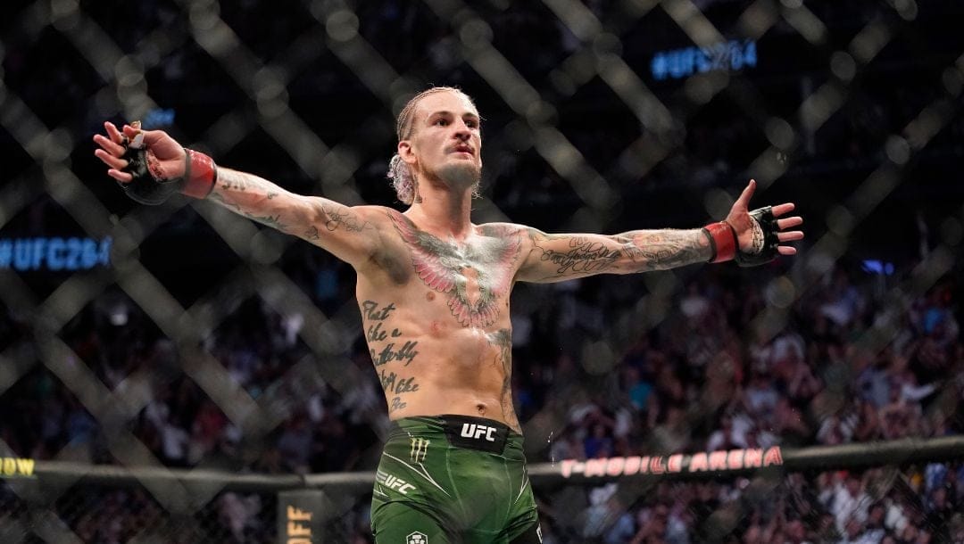 Sean O'Malley celebrates during his bantamweight mixed martial arts bout against Kris Moutinho at UFC 264 on Saturday, July 10, 2021.
