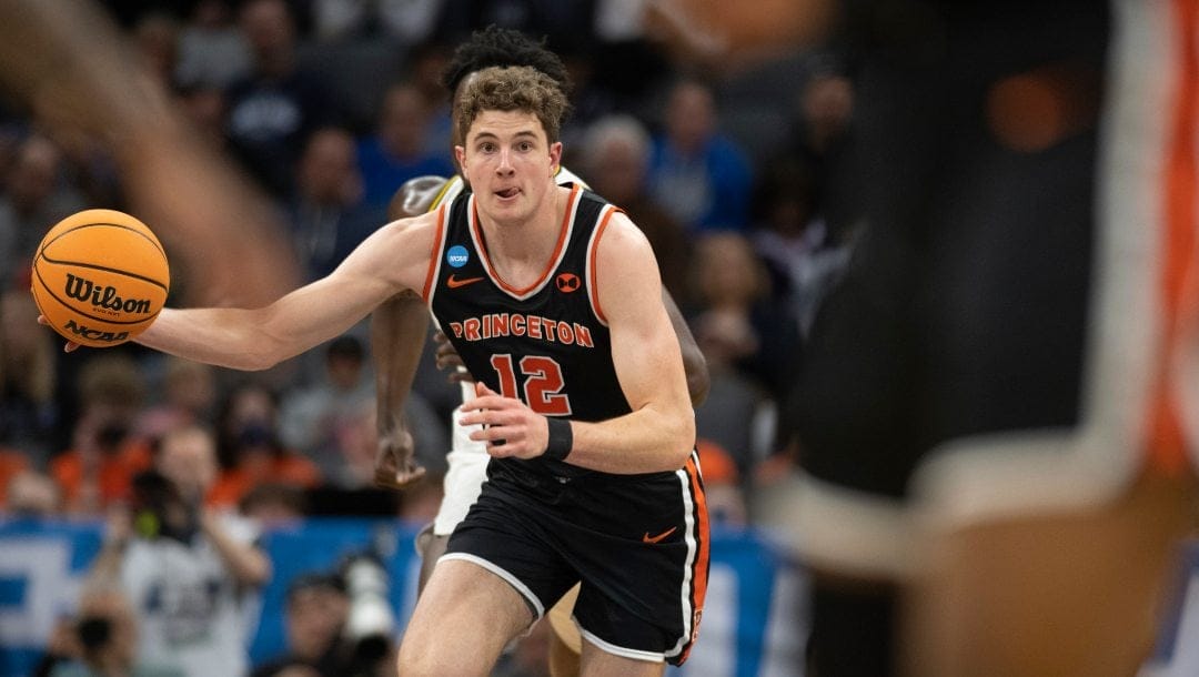 Princeton forward Caden Pierce (12) brings the ball up court in the first half of a second-round college basketball game against Missouri in the NCAA Tournament, Saturday, March 18, 2023, in Sacramento, Calif.
