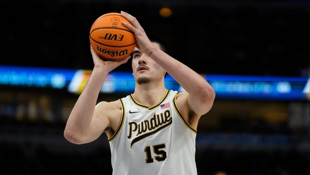 Purdue's Zach Edey shoots a free throw during the first half of an NCAA college basketball championship game against Penn State at the Big Ten men's tournament, Sunday, March 12, 2023, in Chicago.