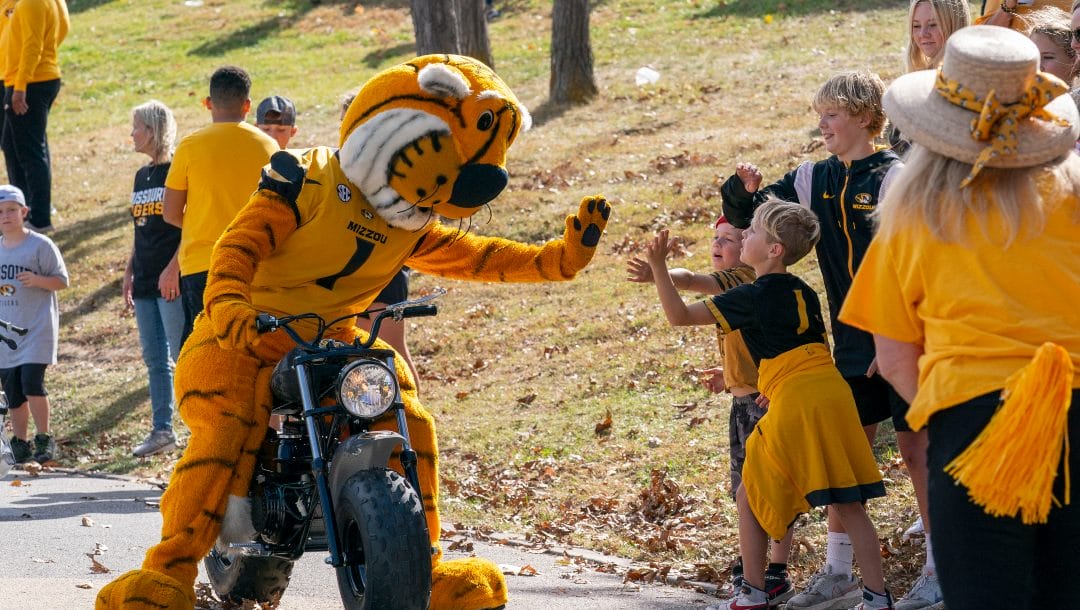 Truman, the Missouri mascot, greets fans outside the stadium before the start of an NCAA college football game against Vanderbilt Saturday, Oct. 22, 2022, in Columbia, Mo.