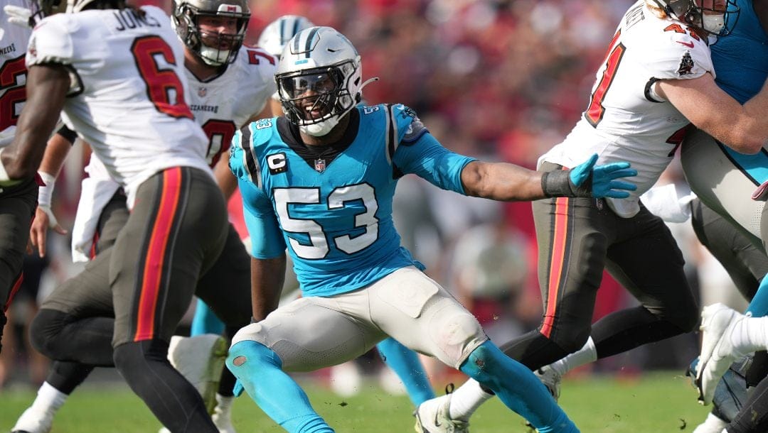 Carolina Panthers defensive end Brian Burns (53) tries to adjust to the ball carrier as he gets into the backfield during an NFL football game against the Tampa Bay Buccaneers, Sunday, January 1, 2023, in Tampa, Fla.
