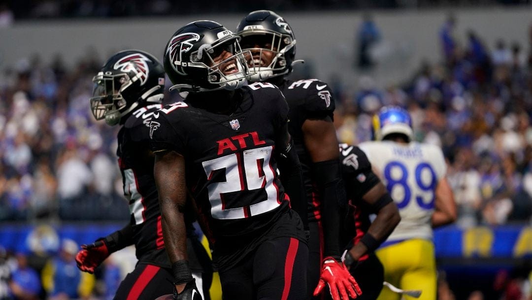 Atlanta Falcons cornerback Casey Hayward, center, celebrates his interception with teammates during the first half of an NFL football game against the Los Angeles Rams, Sunday, Sept. 18, 2022, in Inglewood, Calif.