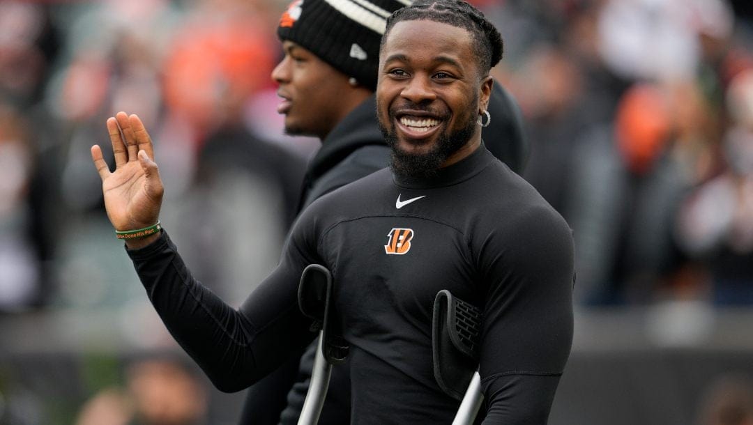 Cincinnati Bengals injured cornerback Chidobe Awuzie stands on the sidelines during an NFL football game against the Cleveland Browns, Tuesday, Dec. 13, 2022, in Cincinnati.