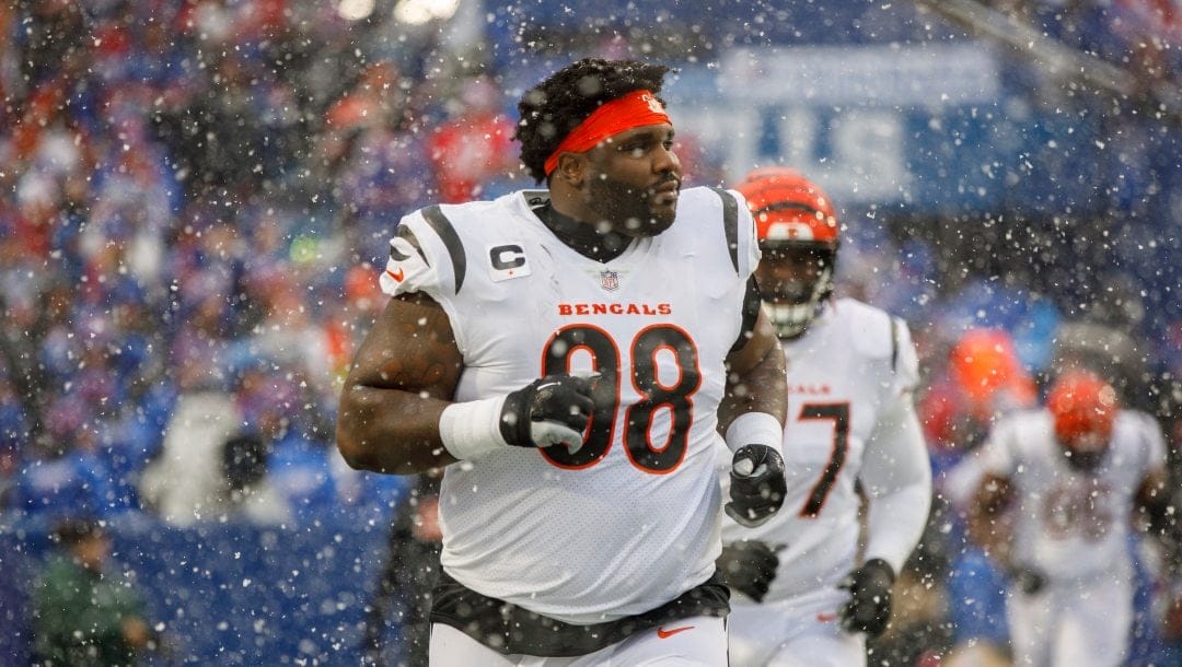 Cincinnati Bengals defensive tackle DJ Reader (98) runs onto the field before an NFL divisional round playoff football game Sunday, Jan. 22, 2023, in Orchard Park, NY.