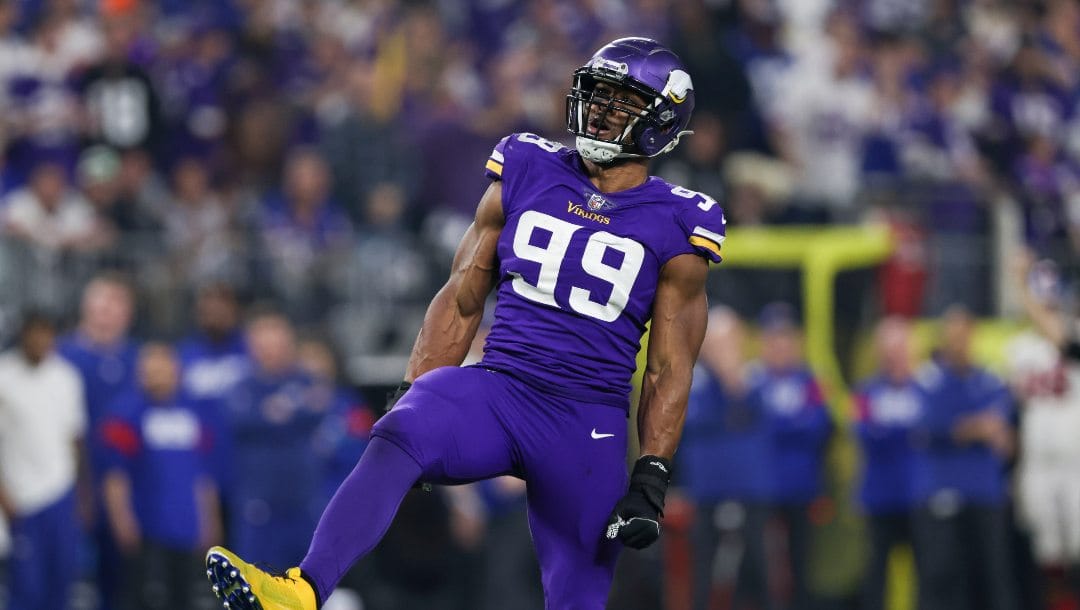 Minnesota Vikings linebacker Danielle Hunter (99) reacts after a play during the second half of an NFL wild-card football game against the New York Giants, Sunday, Jan. 15, 2023 in Minneapolis.