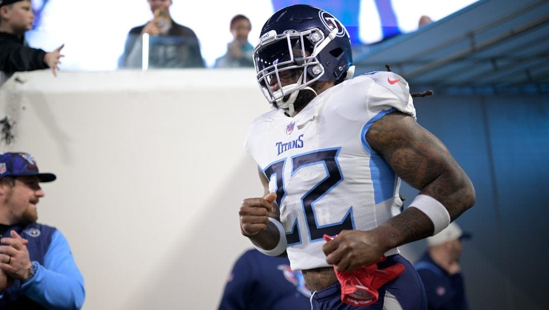 Tennessee Titans running back Derrick Henry (22) jogs to the field before an NFL football game against the Jacksonville Jaguars, Saturday, Jan. 7, 2023, in Jacksonville, Fla.