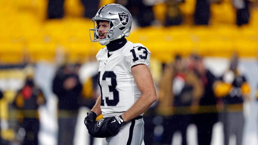 Las Vegas Raiders wide receiver Hunter Renfrow (13) warms up before an NFL football game against the Pittsburgh Steelers, Sunday, Dec. 24, 2022, in Pittsburgh.