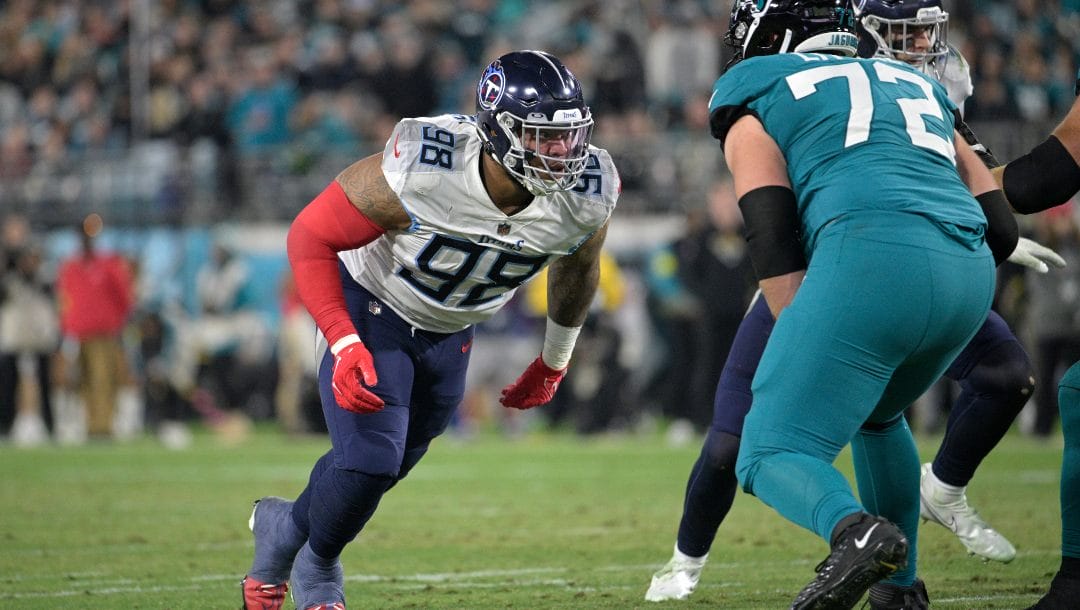 Tennessee Titans defensive tackle Jeffery Simmons (98) follows a play during the second half of an NFL football game against the Jacksonville Jaguars, Saturday, Jan. 7, 2023, in Jacksonville, Fla.