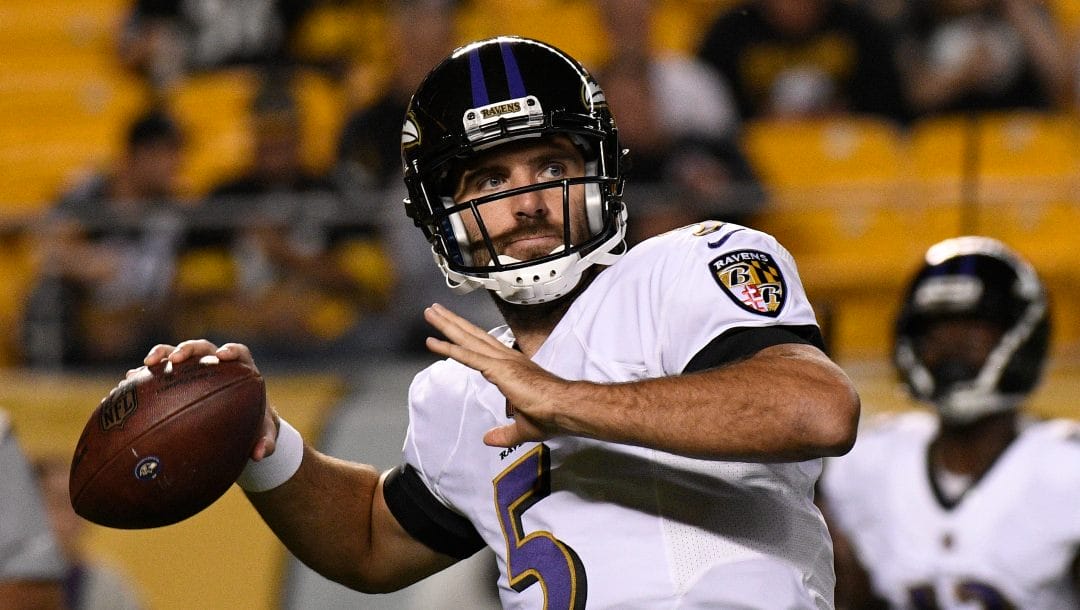 In this Sept. 30, 2018, file photo, Baltimore Ravens quarterback Joe Flacco (5) warms up before an NFL football game against the Pittsburgh Steelers in Pittsburgh. The Ravens ended a three-game losing streak against the rival Pittsburgh Steelers.