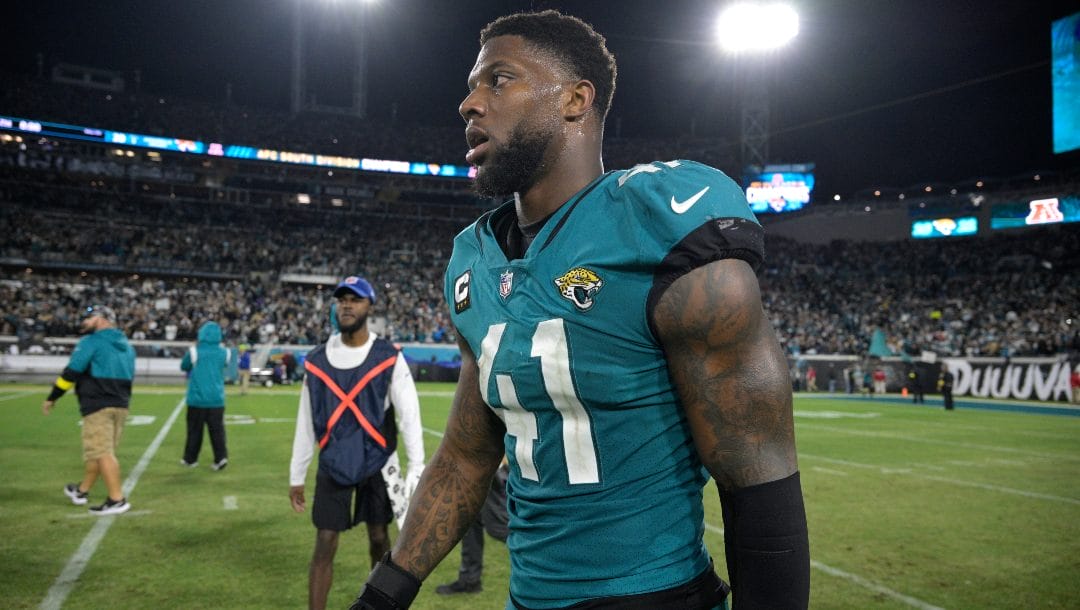 Jacksonville Jaguars linebacker Josh Allen (41) walks on the field after a win against the Tennessee Titans during an NFL football game, Saturday, Jan. 7, 2023, in Jacksonville, Fla.