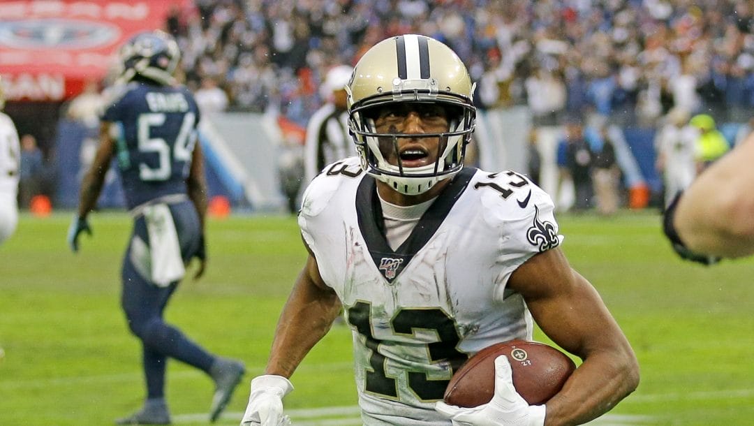 In this Dec. 22, 2019, file photo, New Orleans Saints wide receiver Michael Thomas (13) scores a touchdown on a 2-yard pass reception against the Tennessee Titans during the second half of an NFL football game in Nashville, Tenn. A person familiar with the situation says New Orleans Saints receiver Michael Thomas has agreed to a new one-year contract worth between $10 million and $15 million for the 2023 season. The person spoke to The Associated Press on condition of anonymity on Tuesday, March 14, 2023 because the new agreement has not been announced.