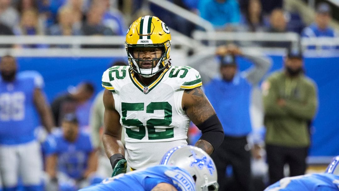 Green Bay Packers linebacker Rashan Gary (52) gets set on defense against the Detroit Lions during an NFL football game, Sunday, Nov. 6, 2022, in Detroit.