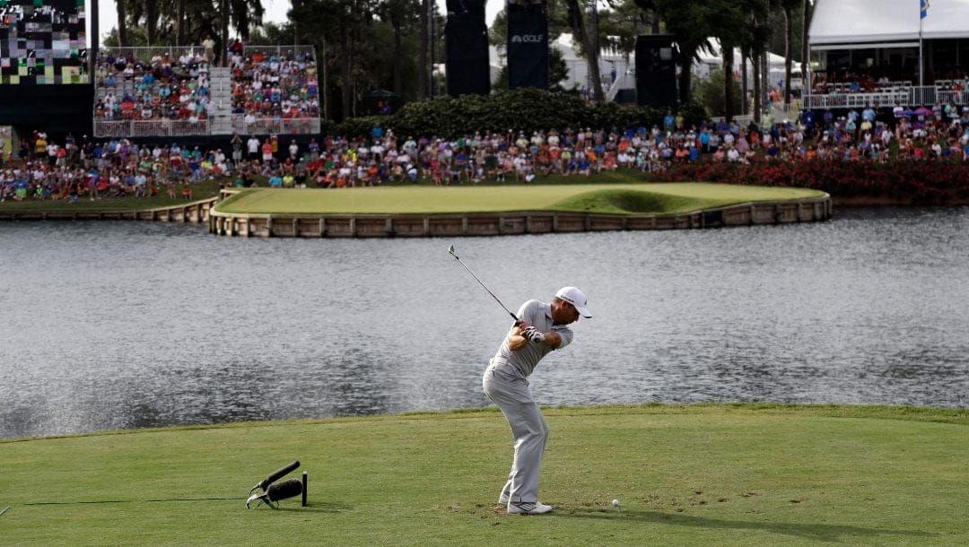 Sergio Garcia, of Spain, hits from the 17th tee during the third round of The Players championship golf tournament at TPC Sawgrass, Saturday, May 10, 2014, in Ponte Vedra Beach, Fla.