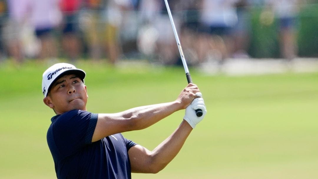 Kurt Kitayama watches his shot on the first fairway during final round of the Arnold Palmer Invitational golf tournament Sunday, March 5, 2023, in Orlando, Fla.