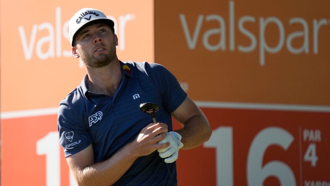 Sam Burns watches his tee shot on the 16th hole during the final round of the Valspar Championship golf tournament Sunday, March 20, 2022, at Innisbrook in Palm Harbor, Fla.