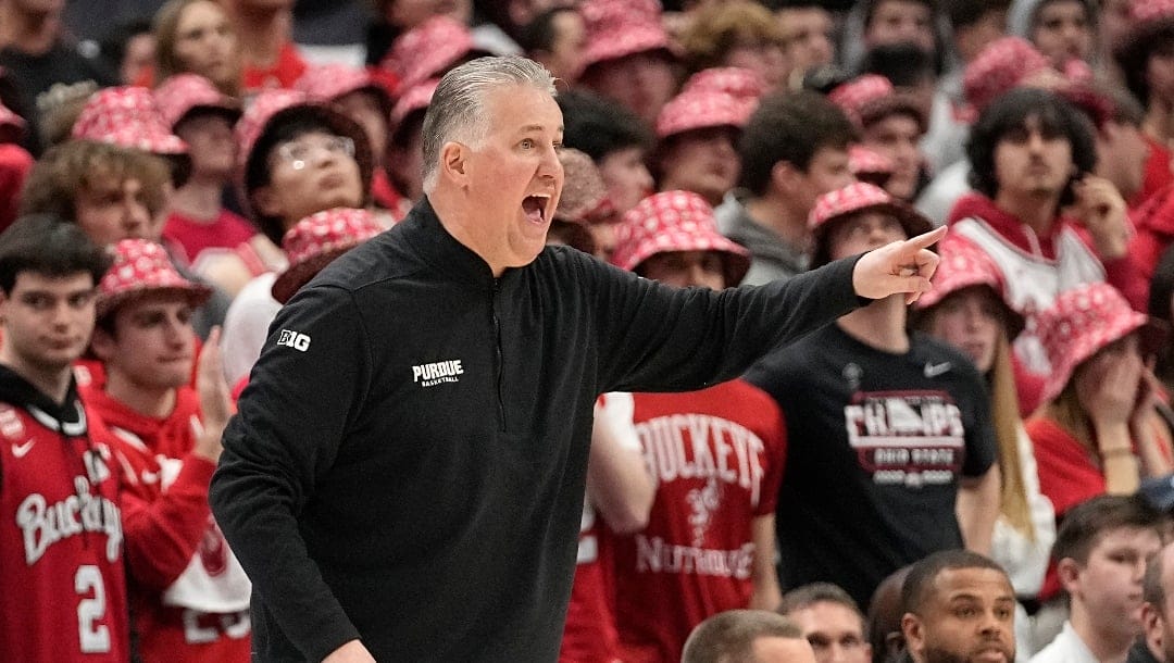 Purdue head coach Matt Painter shouts in the second half of an NCAA college basketball game against Ohio State, Sunday, Feb. 18, 2024, in Columbus, Ohio. (AP Photo/Sue Ogrocki)