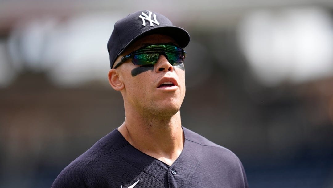 New York Yankees center fielder Aaron Judge walks on the field between innings of an exhibition baseball game against the Washington Nationals, Tuesday, March 28, 2023, in Washington. (AP Photo/Patrick Semansky)
