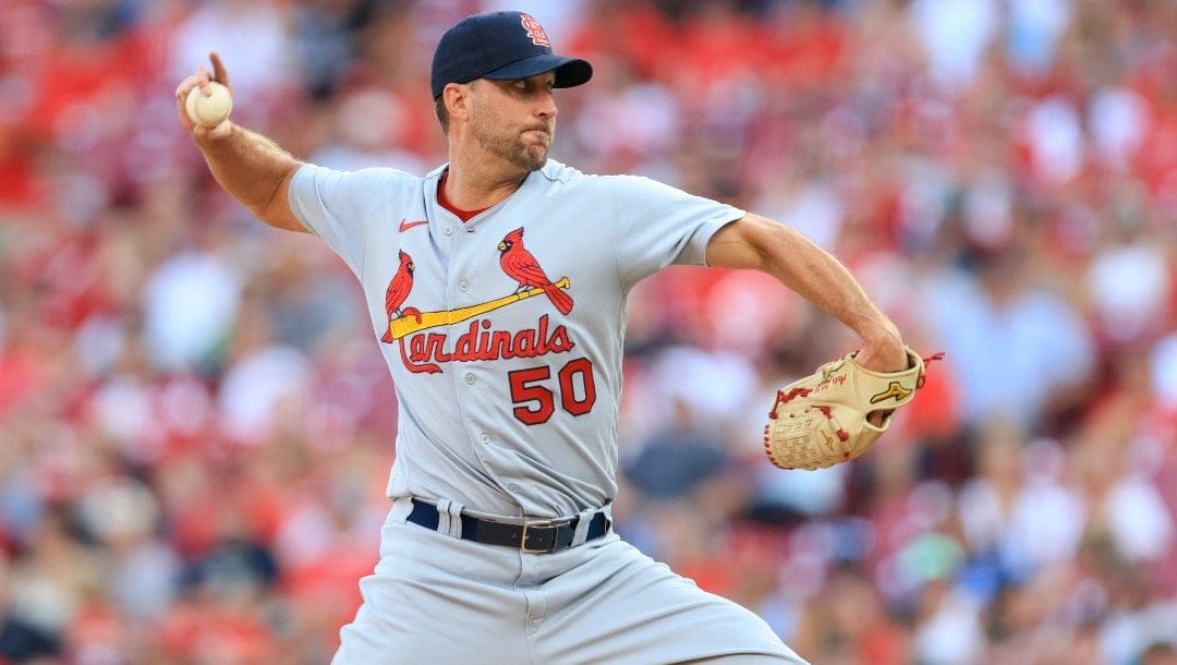 St. Louis Cardinals' Adam Wainwright throws during a baseball game against the Cincinnati Reds in Cincinnati, Friday, July 22, 2022. The Reds won 9-5.