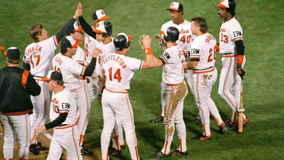 Baltimore Orioles celebrate their ninth inning win against the Boston Red Sox in Baltimore, Wednesday, night, Sept. 8, 1988. Larry Sheets came in to score the game winning run with two outs in the final inning.