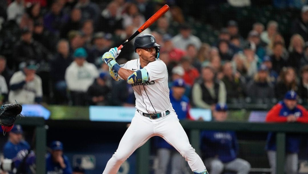 Seattle Mariners' Julio Rodríguez looks on during an at-bat in a baseball game against the Texas Rangers, Thursday, Sept. 28, 2023, in Seattle.