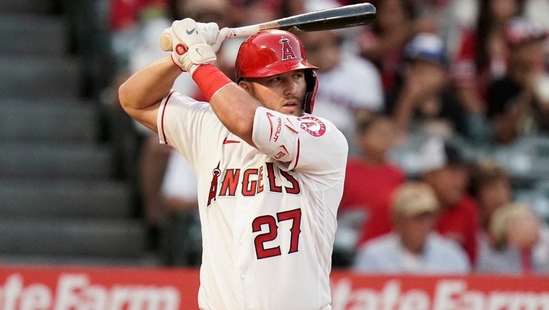 Los Angeles Angels' Mike Trout stands in a batter's box during the third inning of a baseball game against the Houston Astros Tuesday, July 12, 2022, in Anaheim, Calif.
