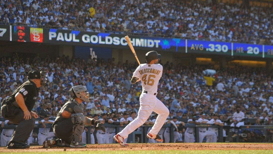 National League's Paul Goldschmidt, of the St. Louis Cardinals, follows through after connecting for a solo home run off American League pitcherShane McClanahan, of the Tampa Bay Rays, during the first inning of the MLB All-Star baseball game, Tuesday, July 19, 2022, in Los Angeles.
