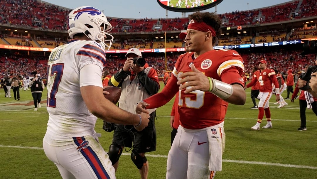 Buffalo Bills quarterback Josh Allen (17) and Kansas City Chiefs quarterback Patrick Mahomes (15) shake hands