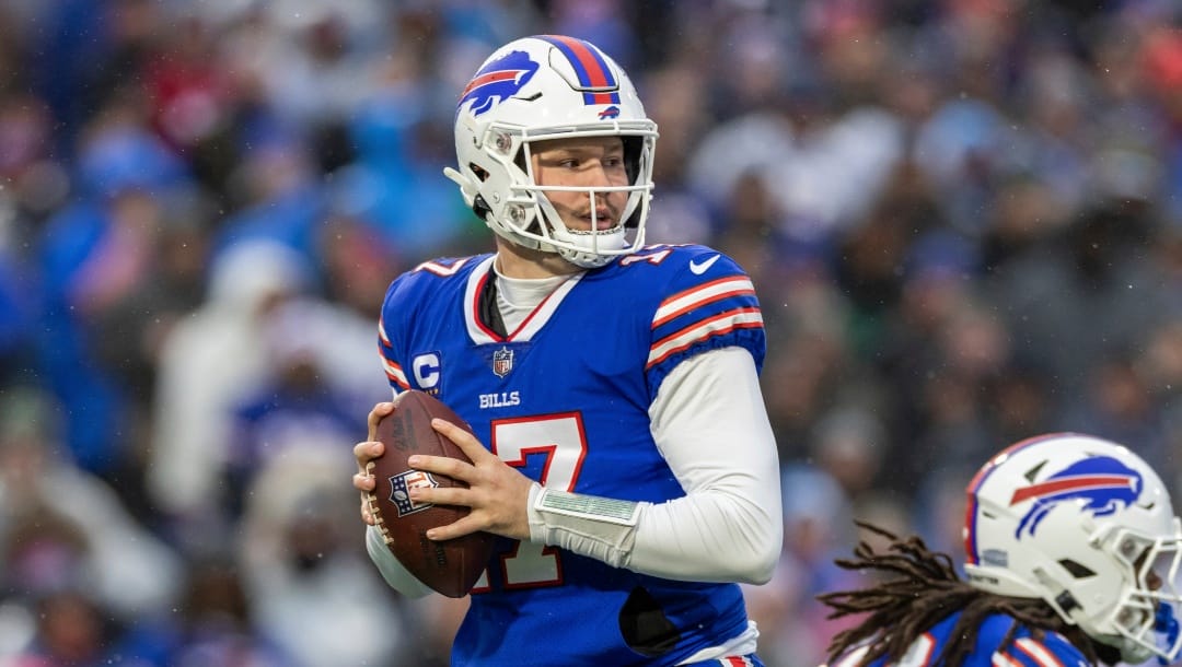 Buffalo Bills quarterback Josh Allen (17) drops back to pass against the New York Jets in an NFL football game, Sunday, Dec. 11, 2022, in Orchard Park, N.Y. Bills won 20-12. (AP Photo/Jeff Lewis)
