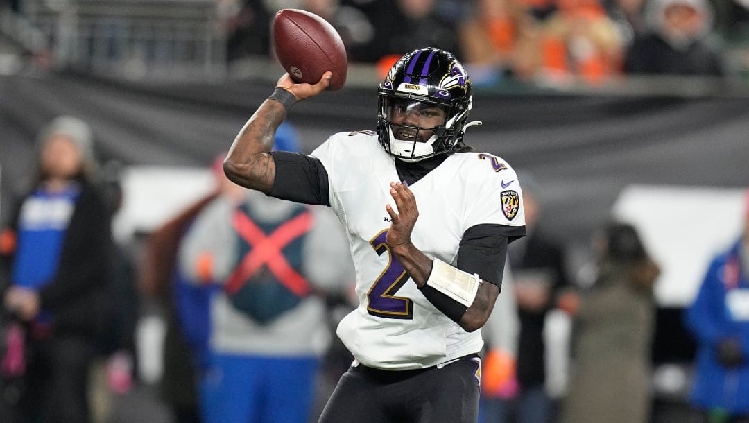 Baltimore Ravens quarterback Tyler Huntley throws