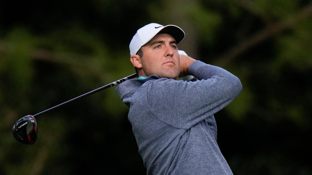 Scottie Scheffler tees off on the 11th hole during the third round at the Masters golf tournament on Saturday, April 9, 2022, in Augusta, Ga. (AP Photo/Jae C. Hong)