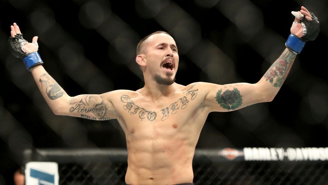 Marlon Vera celebrates a win against Brian Kelleher after their mixed martial arts bout at UFC on Fox 25, Saturday, July 22, 2017.