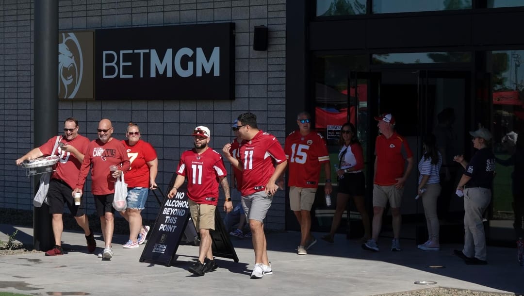 Arizona Cardinals fans exiting the BetMGM Sportsbook at State Farm Stadium