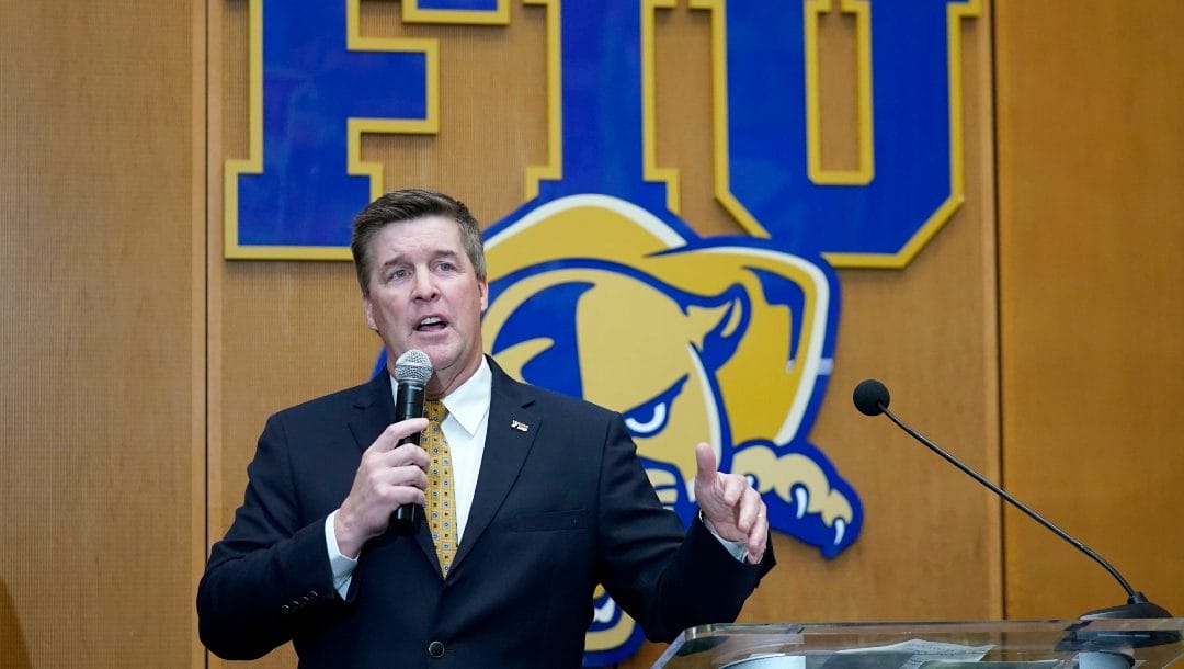 Mike MacIntyre is introduced as the Florida International head football coach during a news conference at the university, Thursday, Dec. 9, 2021, in Miami.