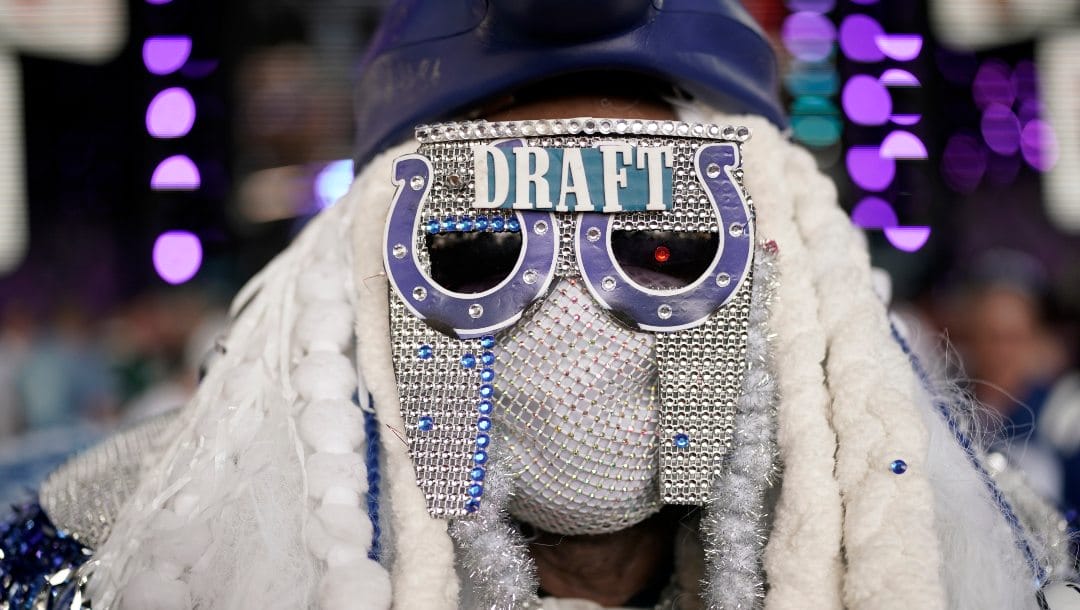 Indianapolis Colts fan Michael Hopson wears a costume with hist team's logo before the second round of the NFL football draft Friday, April 29, 2022, in Las Vegas.