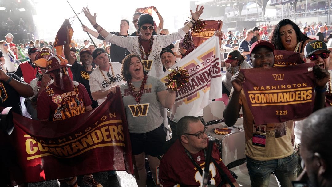 Washington Commanders fans cheer during the second round of the NFL football draft Friday, April 29, 2022, in Las Vegas.