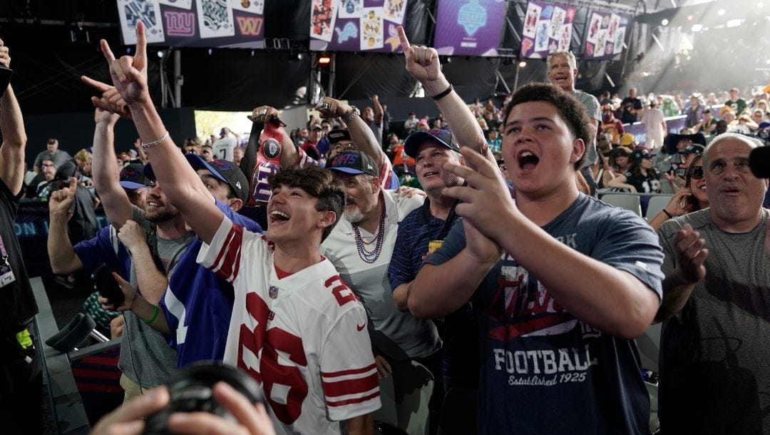 New York Giants fans cheer during the second round of the NFL football draft Friday, April 29, 2022, in Las Vegas.