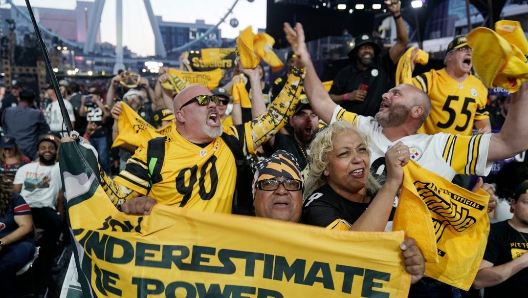Pittsburgh Steelers fans cheer during the third round of the NFL football draft Friday, April 29, 2022, in Las Vegas.
