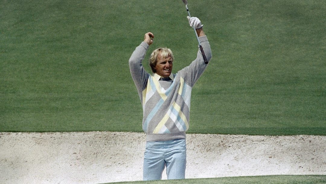 Australian Greg Norman reacts Friday after hitting from the sand on two for an eagle during second round play at the Masters in Augusta, Georgia, Friday, April 7, 1989.