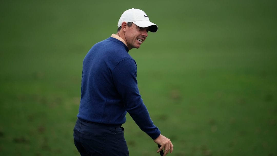 Rory McIlroy, of Northern Ireland, works out on the range during a practice for the Masters golf tournament at Augusta National Golf Club, Tuesday, April 4, 2023, in Augusta, Ga.