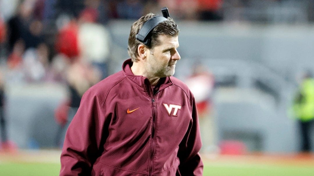 Virginia Tech head coach Brent Pry walks the sidelines during the second half of an NCAA college football game against North Carolina State in Raleigh, N.C., Thursday, Oct. 27, 2022. (AP Photo/Karl B DeBlaker)