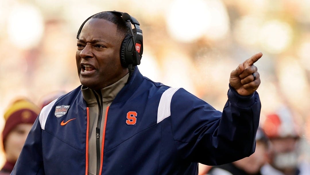 Syracuse head coach Dino Babers reacts against Minnesota during the first half of the Pinstripe Bowl NCAA college football game Thursday, Dec. 29, 2022, in New York. (AP Photo/Adam Hunger)