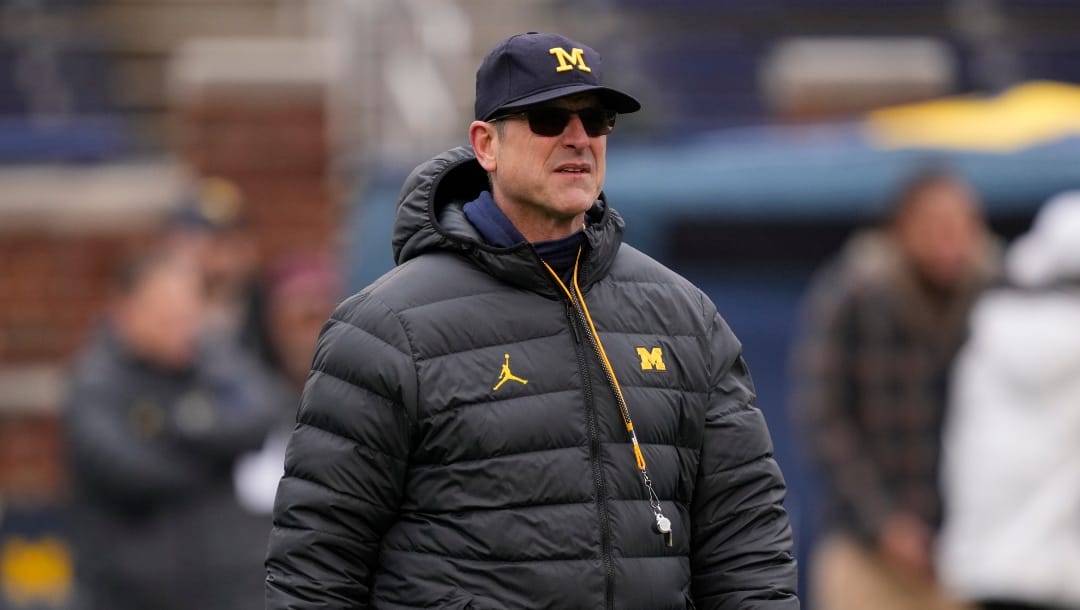 Michigan head coach Jim Harbaugh watches plays during an NCAA college football intra-squad spring game, Saturday, April 1, 2023, in Ann Arbor, Mich. (AP Photo/Carlos Osorio)