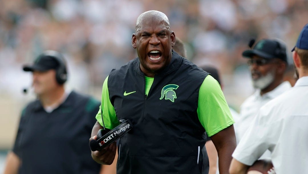 FILE - Michigan State coach Mel Tucker yells during the first half of an NCAA college football game against Akron, Saturday, Sept. 10, 2022, in East Lansing, Mich. Michigan State is the most disappointing team in the Associated Press Big Ten Midseason Awards, Tuesday, Oct. 11, 2022. (AP Photo/Al Goldis, File)